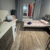 https://cdn-ostrovok-ru-ion.test.edgekey.net/t/100x100/hotel_review/00/25/0025041e6da2288dd2f958ffeef4ce46f6e7ef7e.JPEG