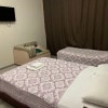 https://cdn-ostrovok-ru-ion.test.edgekey.net/t/100x100/hotel_review/02/e4/02e451c293ac80e462349a60216c9fa05698577e.jpeg