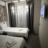 https://cdn-ostrovok-ru-ion.test.edgekey.net/t/100x100/hotel_review/05/3e/053e8b78d73428596f23dafb5500bf83ea04e426.JPEG