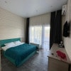 https://cdn-ostrovok-ru-ion.test.edgekey.net/t/100x100/hotel_review/06/ef/06ef49c8126dcc374760df6e80d1c485e8770531.JPEG