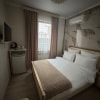 https://cdn-ostrovok-ru-ion.test.edgekey.net/t/100x100/hotel_review/09/a2/09a2781a24b047ea1a0a3e990c02248e3f54322e.JPEG