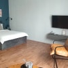 https://cdn-ostrovok-ru-ion.test.edgekey.net/t/100x100/hotel_review/10/c4/10c44361efebdef0d3ca60d91139e04fc54e1dab.jpeg