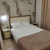 https://cdn-ostrovok-ru-ion.test.edgekey.net/t/100x100/hotel_review/14/80/148051692998d6f5b133c64016e060f8660bbef3.JPEG