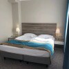 https://cdn-ostrovok-ru-ion.test.edgekey.net/t/100x100/hotel_review/14/ef/14ef37fceaee3e5f73ddd7adaea6c570b25895ed.jpeg
