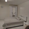 https://cdn-ostrovok-ru-ion.test.edgekey.net/t/100x100/hotel_review/19/e8/19e84e8d788817212400676979771e58a58c4710.JPEG