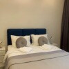 https://cdn-ostrovok-ru-ion.test.edgekey.net/t/100x100/hotel_review/1e/06/1e0675a4ac141746bd4be0783f26e0349982e2c0.JPEG