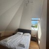 https://cdn-ostrovok-ru-ion.test.edgekey.net/t/100x100/hotel_review/24/e1/24e1f0c21ff142c6e5e5b276bae4fe1ac727a103.JPEG