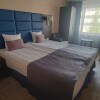 https://cdn-ostrovok-ru-ion.test.edgekey.net/t/100x100/hotel_review/25/80/2580fcbf4f60a45b5e5fbd35faddfcf945a6ae8f.JPEG