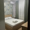 https://cdn-ostrovok-ru-ion.test.edgekey.net/t/100x100/hotel_review/27/78/2778d81033a5a20a728eda28afbe2c4fb5aa2f0f.JPEG