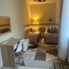 https://cdn-ostrovok-ru-ion.test.edgekey.net/t/100x100/hotel_review/27/83/2783ac8e7ee881a2c42400ca6daa25d200c2dc22.JPEG