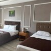 https://cdn-ostrovok-ru-ion.test.edgekey.net/t/100x100/hotel_review/28/2a/282a27c4680b52c87248bda93f4cdc2a8fb12928.JPEG