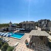https://cdn-ostrovok-ru-ion.test.edgekey.net/t/100x100/hotel_review/2b/4d/2b4d2754292601e23539fb424216a37836548b74.JPEG