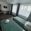 https://cdn-ostrovok-ru-ion.test.edgekey.net/t/100x100/hotel_review/2c/fb/2cfb4c558cdd7897413fc9d7028f571001e52990.JPEG