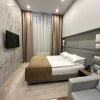 https://cdn-ostrovok-ru-ion.test.edgekey.net/t/100x100/hotel_review/30/95/3095cbc0c21593849536944fd319ac45df5b7fb2.JPEG