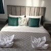 https://cdn-ostrovok-ru-ion.test.edgekey.net/t/100x100/hotel_review/31/0a/310ad647355d8790a5e26976e44dab8771c0fbcb.JPEG