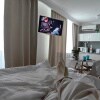 https://cdn-ostrovok-ru-ion.test.edgekey.net/t/100x100/hotel_review/35/86/358618936953a217a562ce65404f2d4b04cc2140.JPEG