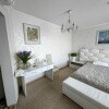 https://cdn-ostrovok-ru-ion.test.edgekey.net/t/100x100/hotel_review/35/d9/35d9f01502fc3d8f6b62c1f7010081115a258612.JPEG