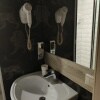 https://cdn-ostrovok-ru-ion.test.edgekey.net/t/100x100/hotel_review/39/64/39647f370405ec8c361aa0394e03e99ce0106172.JPEG