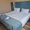https://cdn-ostrovok-ru-ion.test.edgekey.net/t/100x100/hotel_review/3f/af/3fafee4a0da2fa321223404a0a90c1996e3dde92.JPEG