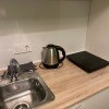 https://cdn-ostrovok-ru-ion.test.edgekey.net/t/100x100/hotel_review/41/36/41369eb4599c6e05622713d9990eeb808417eeca.JPEG