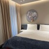 https://cdn-ostrovok-ru-ion.test.edgekey.net/t/100x100/hotel_review/44/f6/44f6a0c02ae15537a7139287521f910d5178031e.JPEG