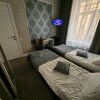 https://cdn-ostrovok-ru-ion.test.edgekey.net/t/100x100/hotel_review/55/0a/550a331eff199e705c19e49ae69eafc0d152882b.JPEG