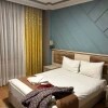 https://cdn-ostrovok-ru-ion.test.edgekey.net/t/100x100/hotel_review/55/9f/559f5b003a768771bab931df5e38f20623d1d373.JPEG