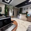 https://cdn-ostrovok-ru-ion.test.edgekey.net/t/100x100/hotel_review/75/f7/75f73c83b9021c216a7da47179f85edce6ea8801.JPEG
