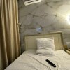 https://cdn-ostrovok-ru-ion.test.edgekey.net/t/100x100/hotel_review/77/e1/77e1b62b5c852d099cb9999298c932ff76a51fba.JPEG
