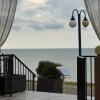 https://cdn-ostrovok-ru-ion.test.edgekey.net/t/100x100/hotel_review/77/e8/77e805ff2d9fd9a254dfb97c67579063691ef244.JPEG
