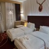 https://cdn-ostrovok-ru-ion.test.edgekey.net/t/100x100/hotel_review/7f/dd/7fdd959acdc0ed16a2b831f34f3312395cbaca06.JPEG