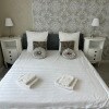 https://cdn-ostrovok-ru-ion.test.edgekey.net/t/100x100/hotel_review/84/85/848587f3d6b9d8e2a0841552cf5ec3464053b5f0.JPEG