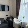 https://cdn-ostrovok-ru-ion.test.edgekey.net/t/100x100/hotel_review/87/8e/878e591a0395780c271520585f83a96a30ef5a1c.JPEG