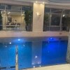 https://cdn-ostrovok-ru-ion.test.edgekey.net/t/100x100/hotel_review/8c/5b/8c5b6c77b62616c0e1aec366788adf371c582e64.JPEG