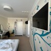 https://cdn-ostrovok-ru-ion.test.edgekey.net/t/100x100/hotel_review/8f/b2/8fb2c2980fa610c669e225a4d149e6891afc5abb.JPEG