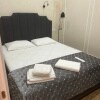 https://cdn-ostrovok-ru-ion.test.edgekey.net/t/100x100/hotel_review/90/75/9075d2fd184448a9f5a235c526b3b2728caf5dd7.JPEG