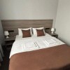 https://cdn-ostrovok-ru-ion.test.edgekey.net/t/100x100/hotel_review/93/41/9341c5014d08b48e3b774b7c678d00318dede2af.JPEG