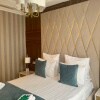 https://cdn-ostrovok-ru-ion.test.edgekey.net/t/100x100/hotel_review/94/cf/94cf202b2d93ea61f80b213065cc4945d7cc0a7a.jpeg