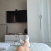 https://cdn-ostrovok-ru-ion.test.edgekey.net/t/100x100/hotel_review/97/99/9799c5622eafba112ff9d70410d32da0973fd8ef.JPEG