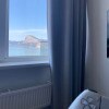https://cdn-ostrovok-ru-ion.test.edgekey.net/t/100x100/hotel_review/99/f8/99f806749b9d48fc3b700e5a04e28e2c221b5a62.JPEG