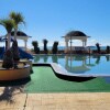 https://cdn-ostrovok-ru-ion.test.edgekey.net/t/100x100/hotel_review/9a/zz/9aad74b9715c7a572c8b3bc718224f224800490e.JPEG