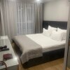 https://cdn-ostrovok-ru-ion.test.edgekey.net/t/100x100/hotel_review/9b/40/9b401b0325ba78d5f4d514dbb139911e5012f79b.JPEG
