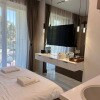 https://cdn-ostrovok-ru-ion.test.edgekey.net/t/100x100/hotel_review/a4/86/a486b7d587a68042cded1ad2d643ef9133641da9.JPEG