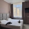 https://cdn-ostrovok-ru-ion.test.edgekey.net/t/100x100/hotel_review/aa/22/aa22ddd649a584313a7ec2e97ff7908bce2a5850.JPEG