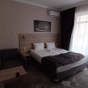 https://cdn-ostrovok-ru-ion.test.edgekey.net/t/100x100/hotel_review/aa/39/aa399412ed376989fbe14c244c226b4a26abc81e.jpeg
