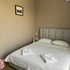 https://cdn-ostrovok-ru-ion.test.edgekey.net/t/100x100/hotel_review/ac/5e/ac5e0f1d431a906ca902ab7c873df6744f508a0a.JPEG
