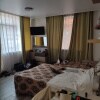 https://cdn-ostrovok-ru-ion.test.edgekey.net/t/100x100/hotel_review/af/8d/af8daa1e5a3811df170f5fa53fc0db2adcecf004.JPEG