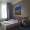 https://cdn-ostrovok-ru-ion.test.edgekey.net/t/100x100/hotel_review/b1/2c/b12cf87e8dab3d08c1fcd7306937421fc205aa55.jpeg