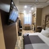 https://cdn-ostrovok-ru-ion.test.edgekey.net/t/100x100/hotel_review/b2/27/b227ea50e16f5e3a90206b3691567f5d3efa3679.JPEG
