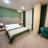 https://cdn-ostrovok-ru-ion.test.edgekey.net/t/100x100/hotel_review/b6/bf/b6bffc9e8c7a90df98233be27994fc0077acc750.JPEG
